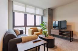 Modern 2-BR Retreat w/ Gym & Pool | VIATO HOMES - Image 2