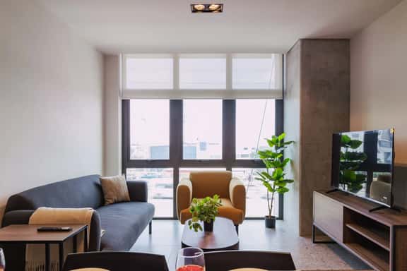 Modern 2-BR Retreat w/ Gym & Pool | VIATO HOMES - Image 1