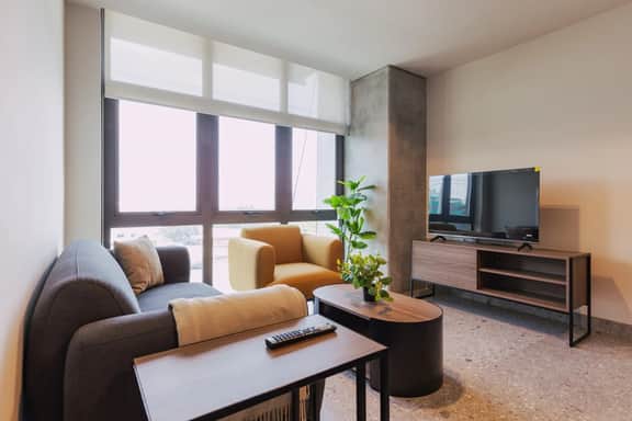 Modern 2-BR Retreat w/ Gym & Pool | VIATO HOMES - Image 2