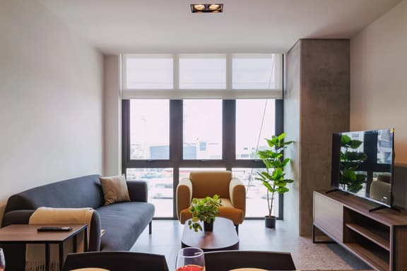 Modern 2-BR Retreat w/ Gym & Pool | VIATO HOMES - Image 1